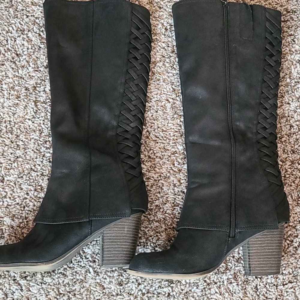 Black knee high boots.